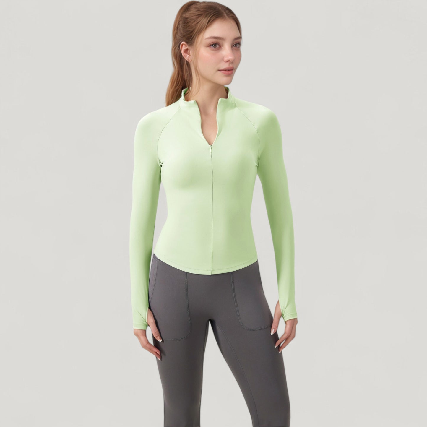 Long Sleeve Half-Zip Slim Fit Active Jacket with Thumbhole Cuffs and Mock Neck