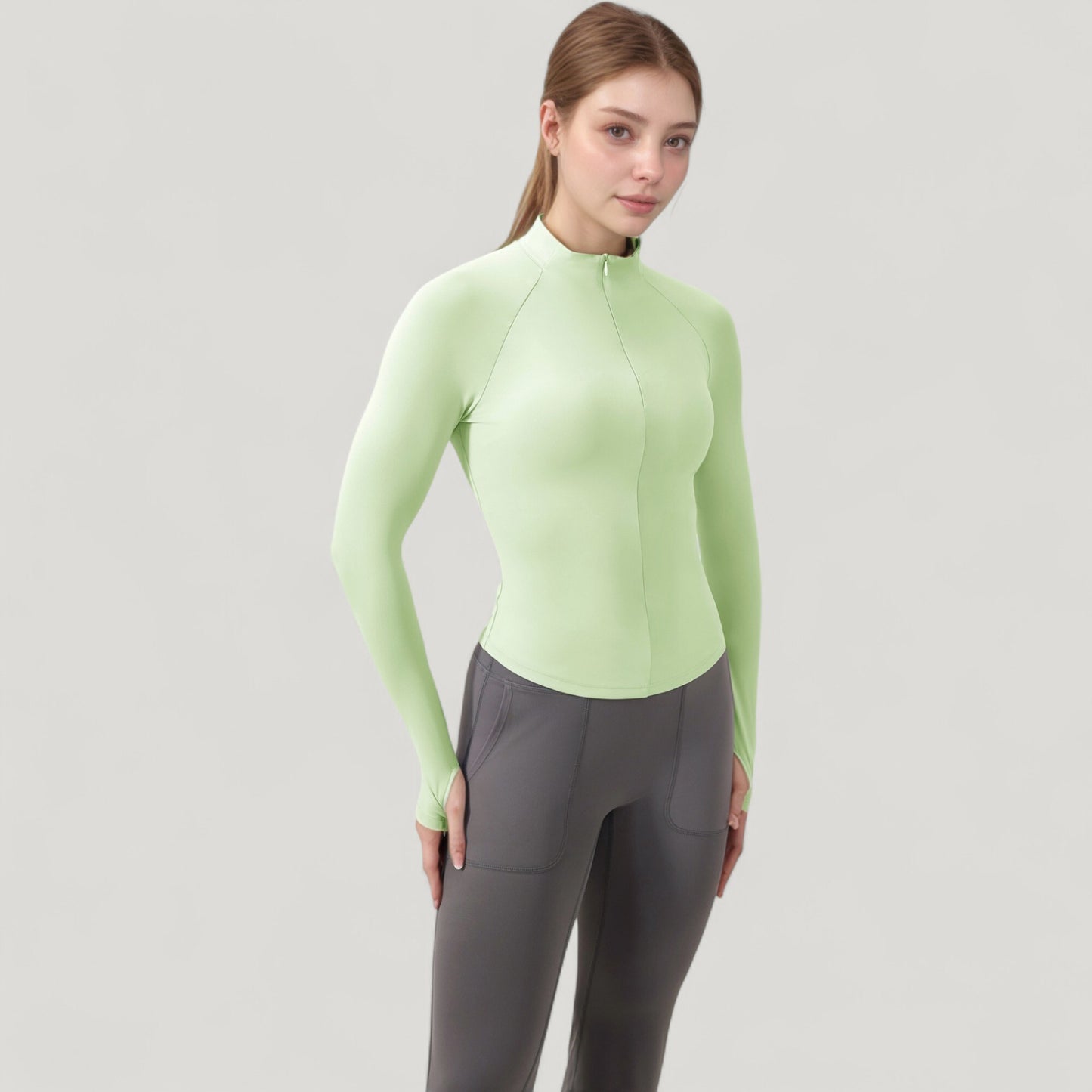 Long Sleeve Half-Zip Slim Fit Active Jacket with Thumbhole Cuffs and Mock Neck