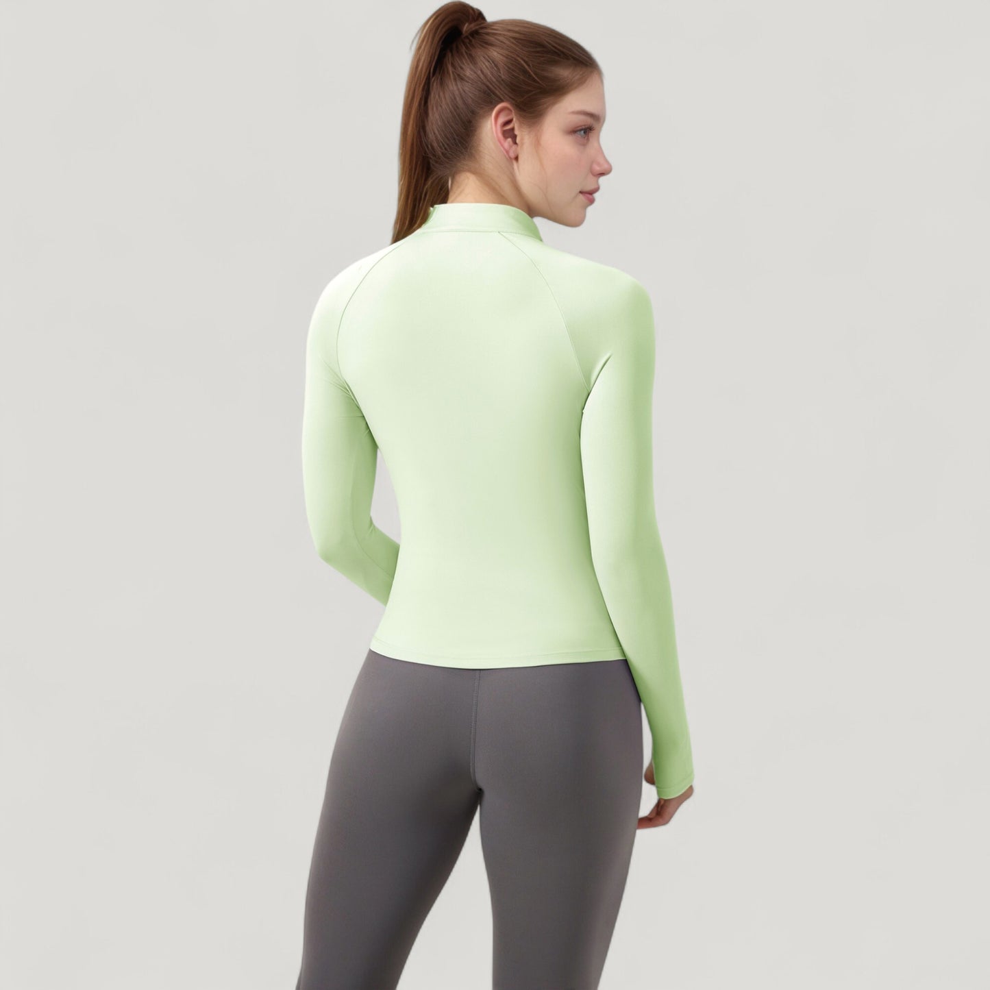 Long Sleeve Half-Zip Slim Fit Active Jacket with Thumbhole Cuffs and Mock Neck