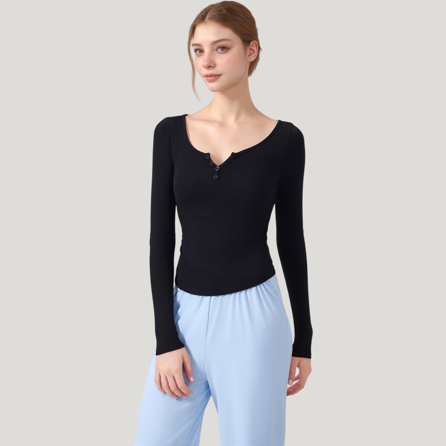 Long Sleeve Henley Activewear Top with Scoop Neckline and Streamlined Fitted Silhouette