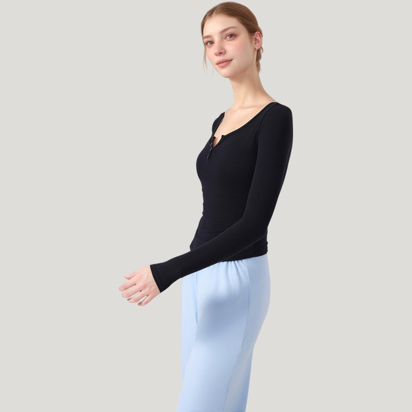 Long Sleeve Henley Activewear Top with Scoop Neckline and Streamlined Fitted Silhouette