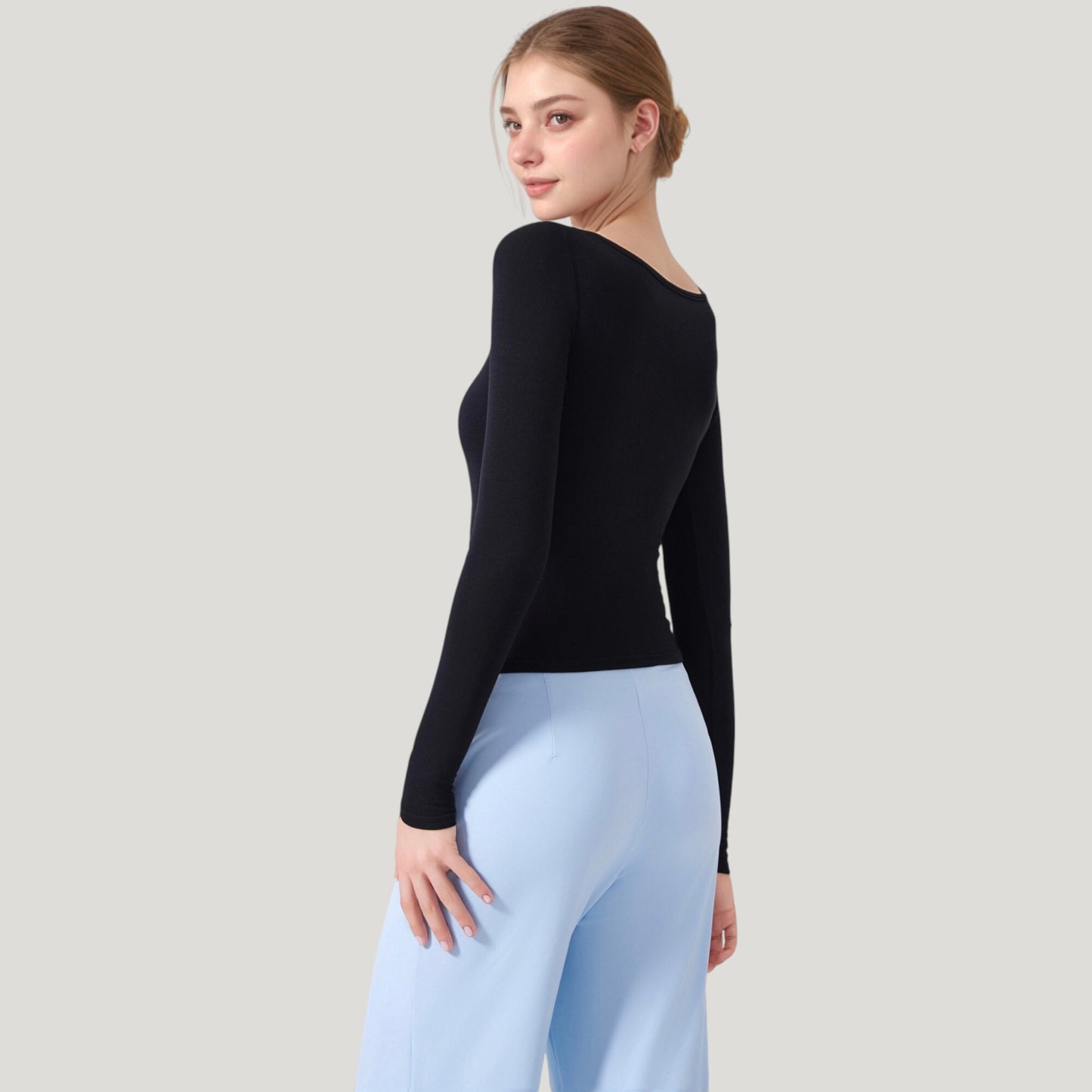Long Sleeve Henley Activewear Top with Scoop Neckline and Streamlined Fitted Silhouette