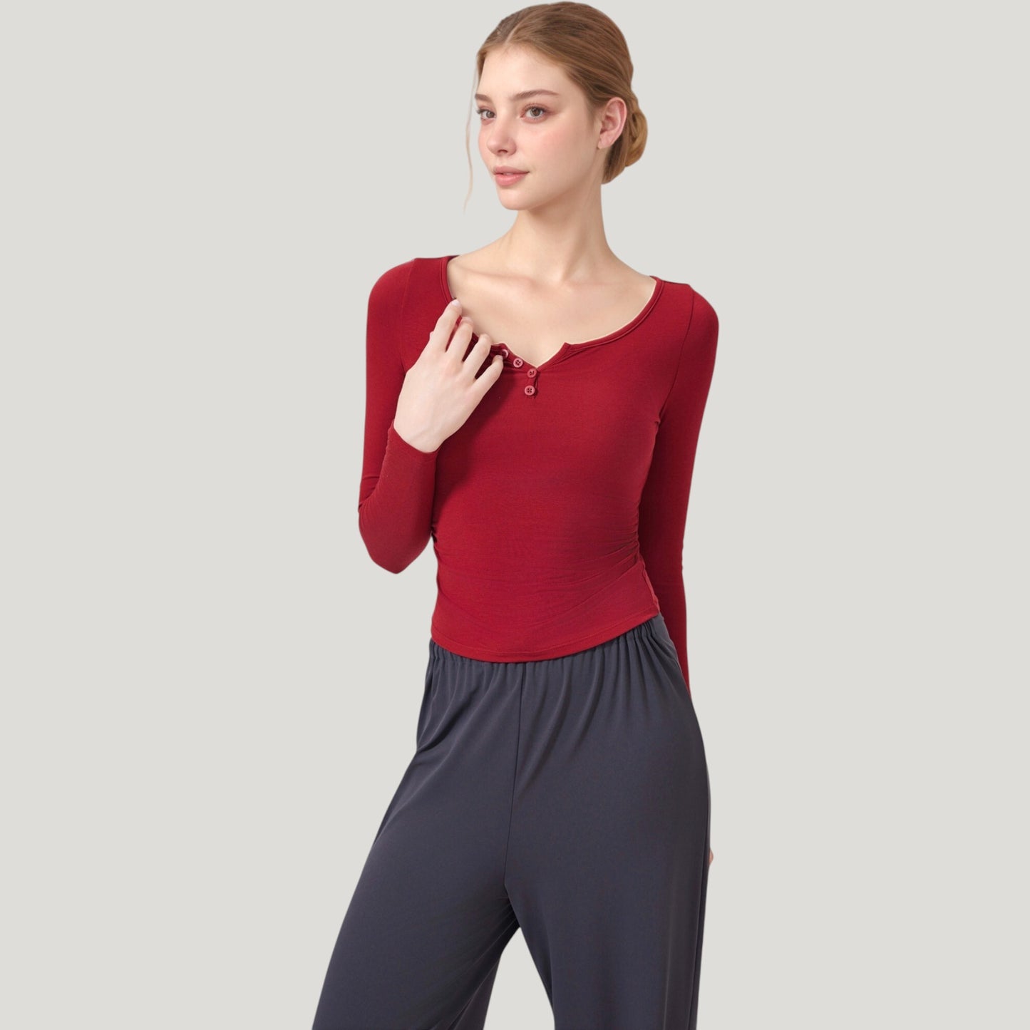 Long Sleeve Henley Activewear Top with Scoop Neckline and Streamlined Fitted Silhouette