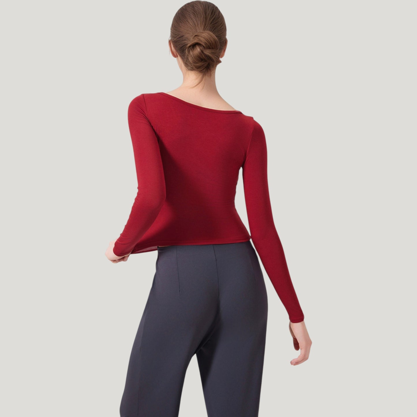 Long Sleeve Henley Activewear Top with Scoop Neckline and Streamlined Fitted Silhouette
