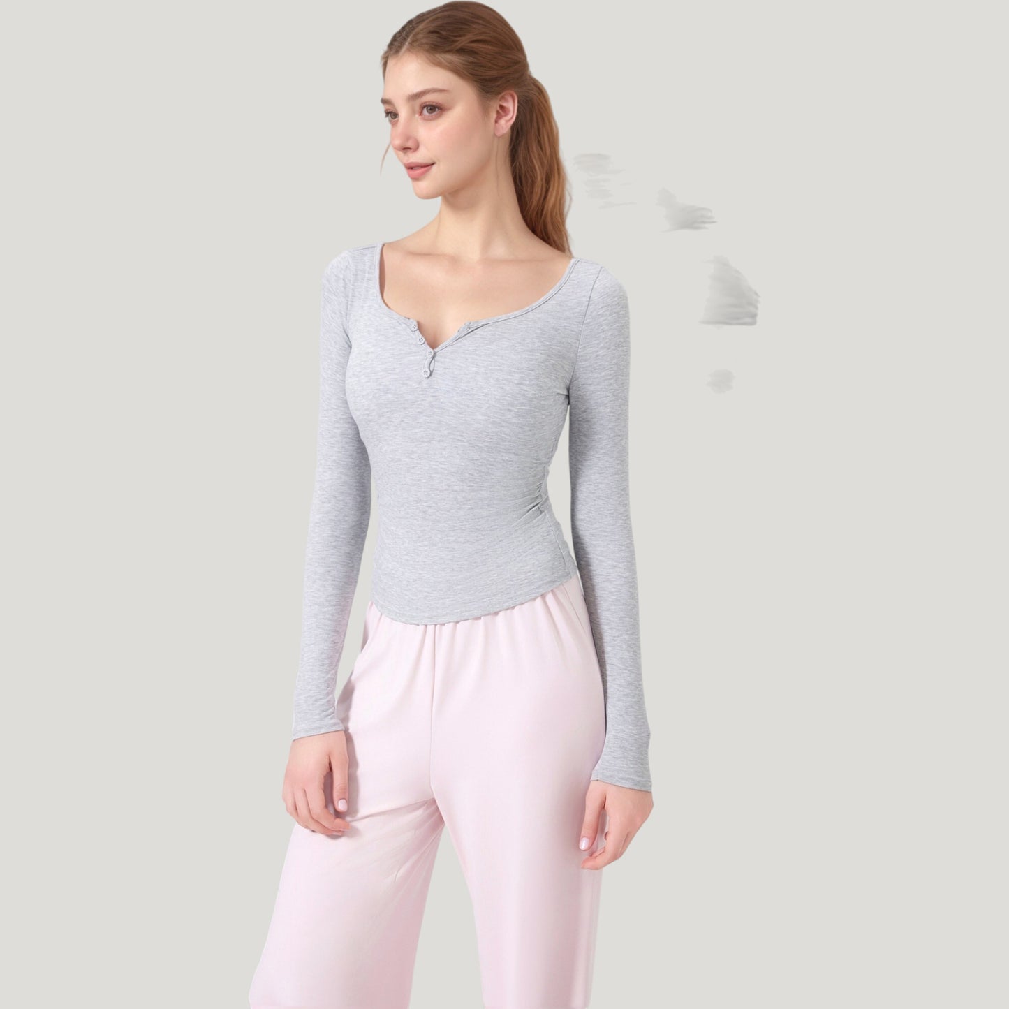 Long Sleeve Henley Activewear Top with Scoop Neckline and Streamlined Fitted Silhouette