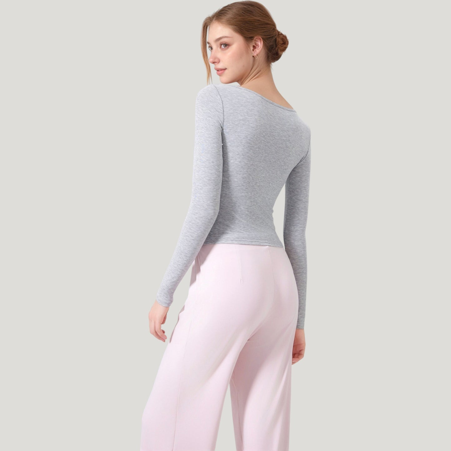 Long Sleeve Henley Activewear Top with Scoop Neckline and Streamlined Fitted Silhouette