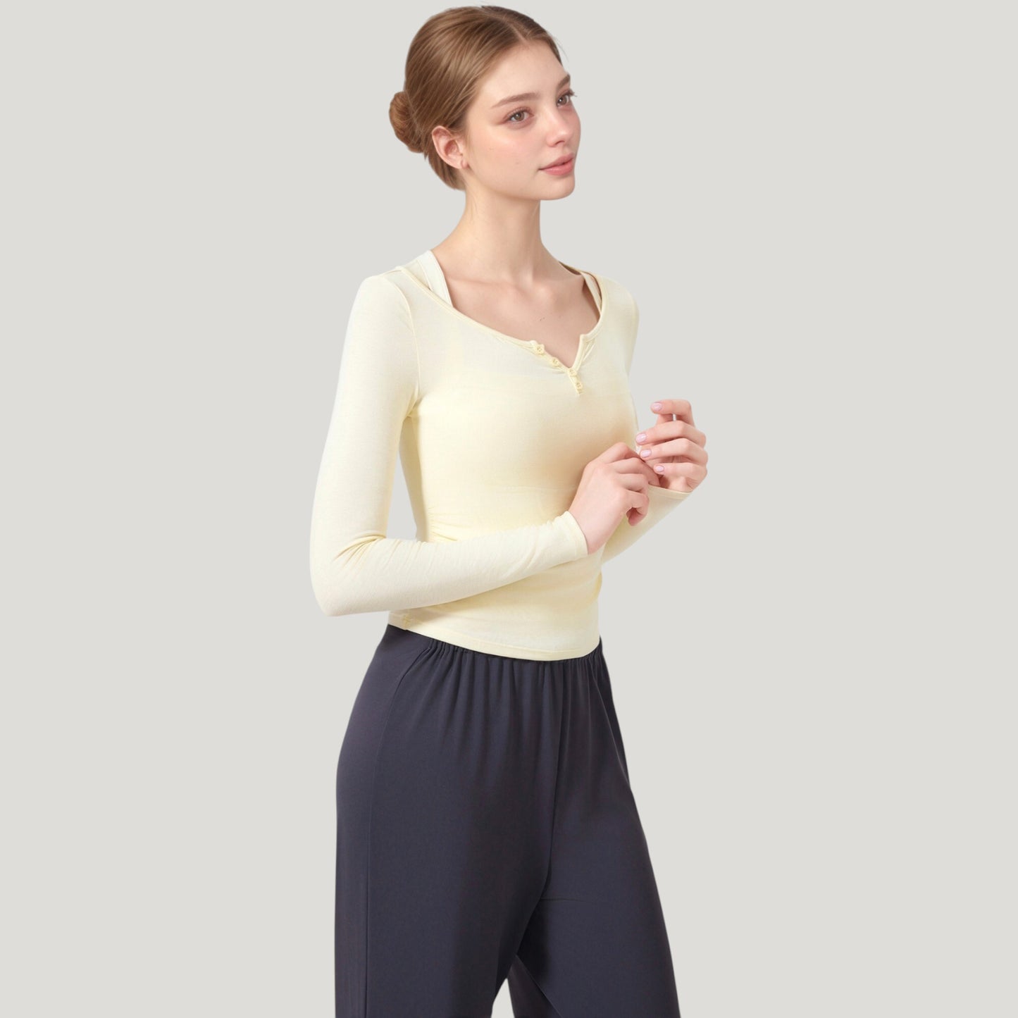 Long Sleeve Henley Activewear Top with Scoop Neckline and Streamlined Fitted Silhouette