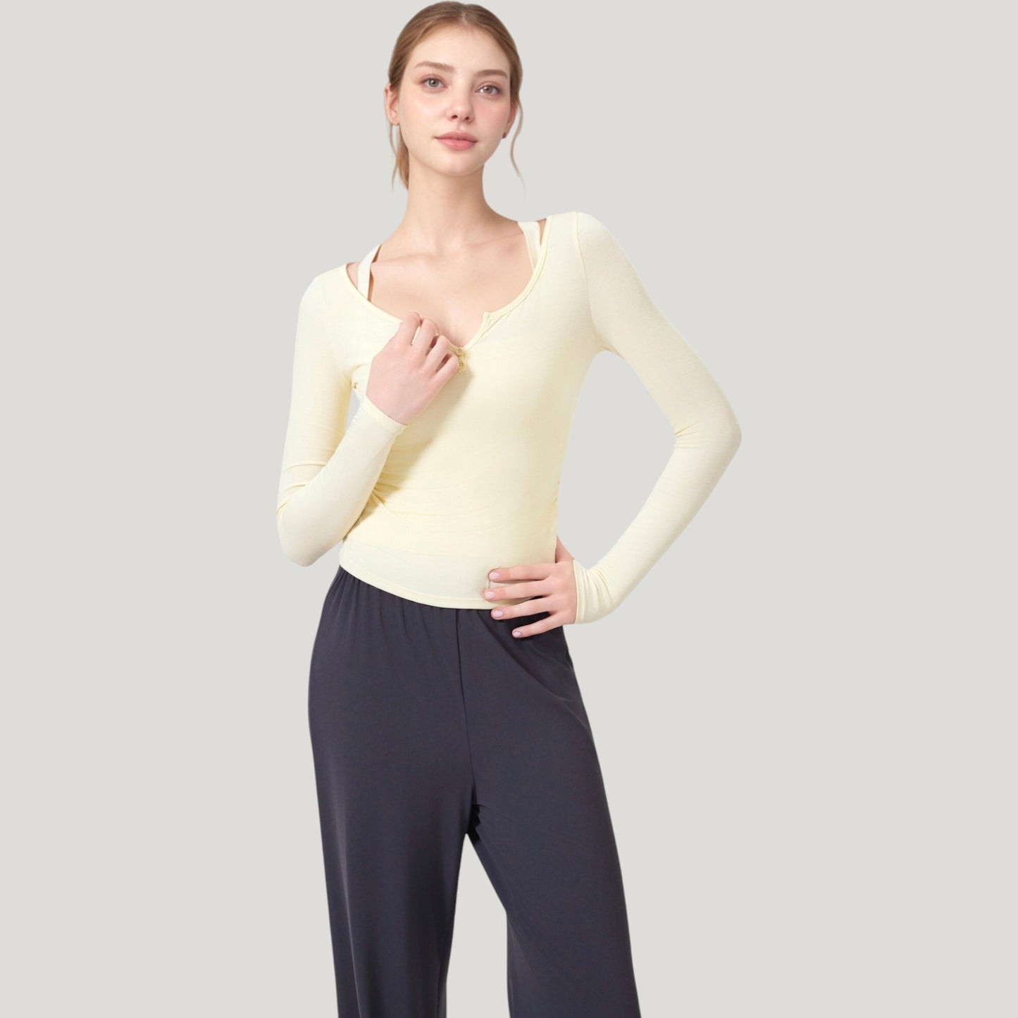 Long Sleeve Henley Activewear Top with Scoop Neckline and Streamlined Fitted Silhouette