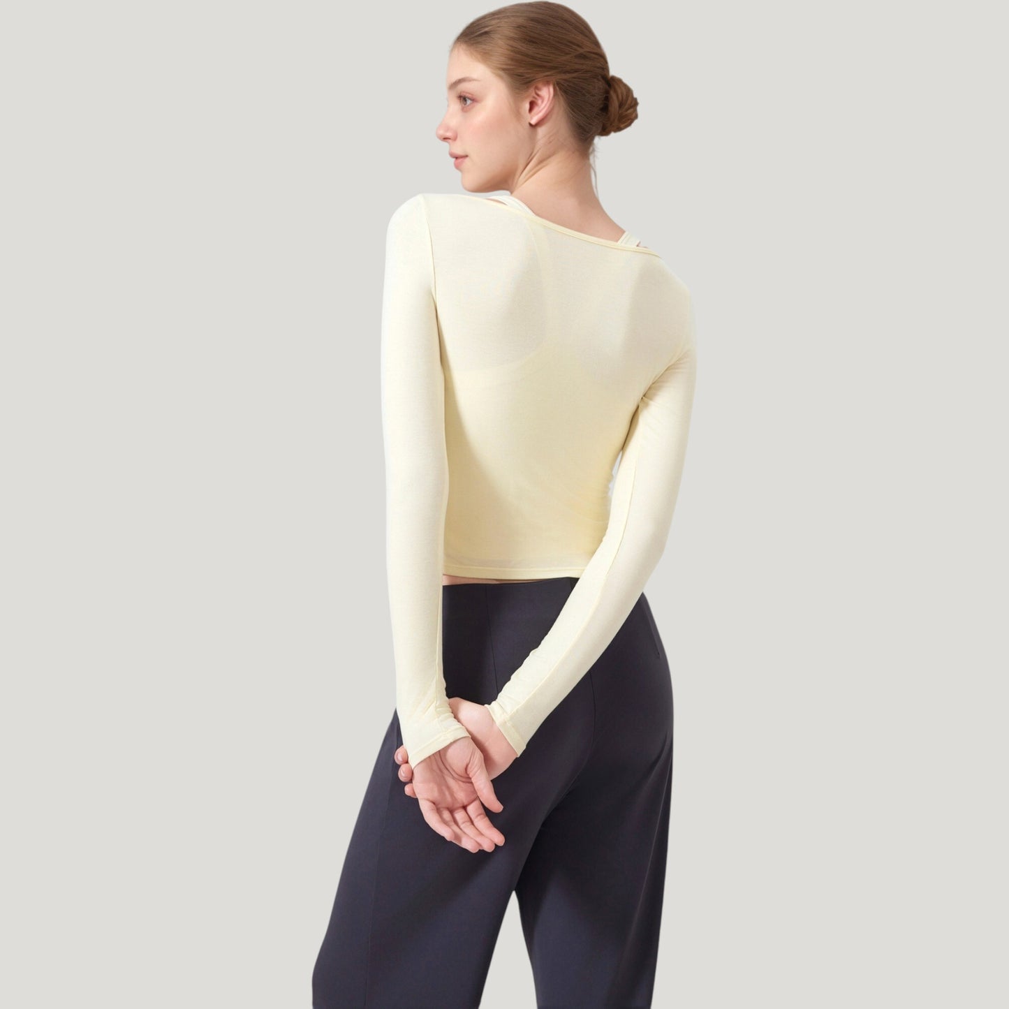 Long Sleeve Henley Activewear Top with Scoop Neckline and Streamlined Fitted Silhouette