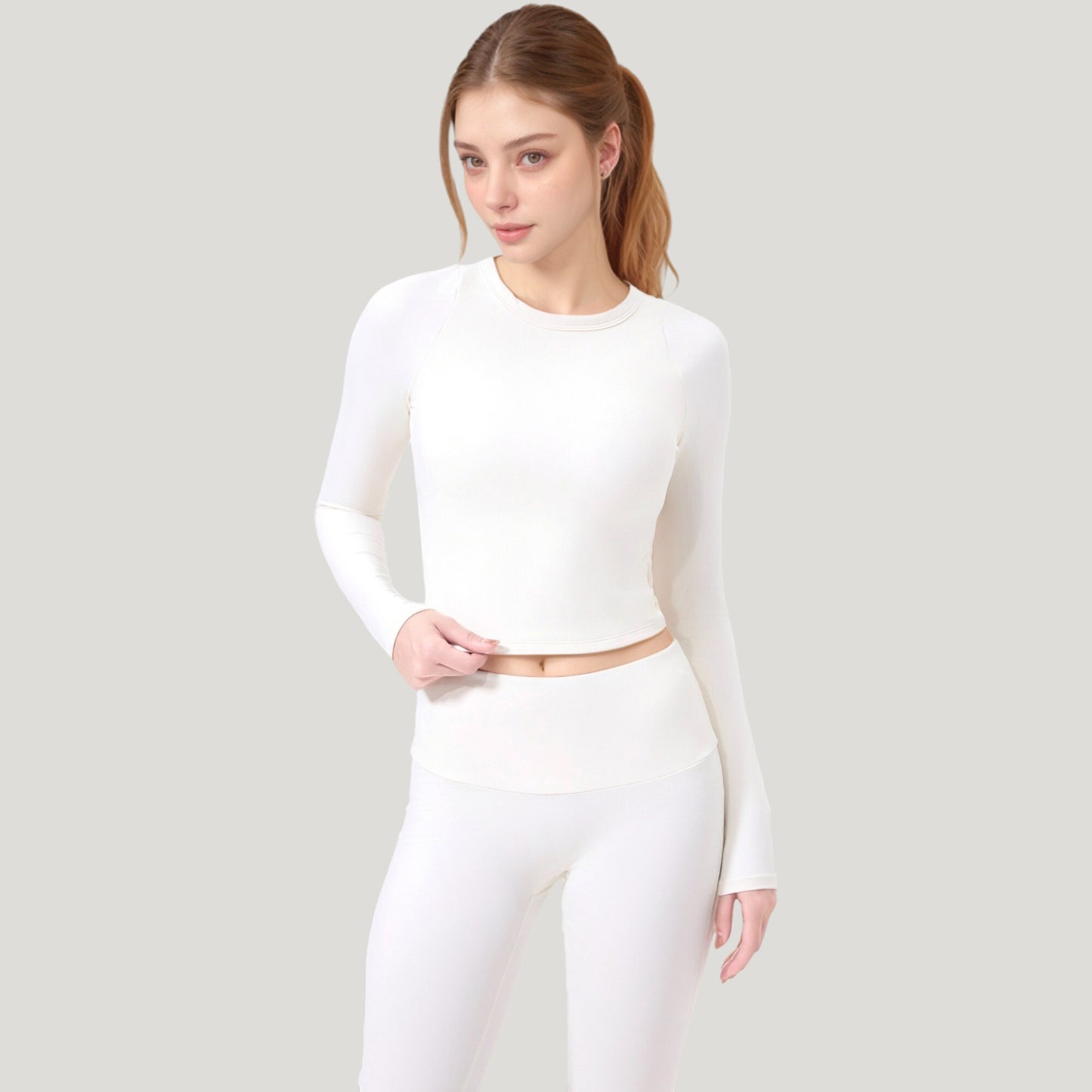 Long Sleeve Cropped Sports Top with Open Back and Crisscross Strap Detail