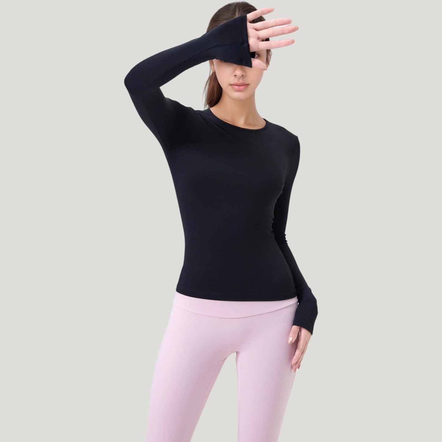 Long Sleeve Fitted Activewear Top with Crew Neck and Thumbhole Cuffs