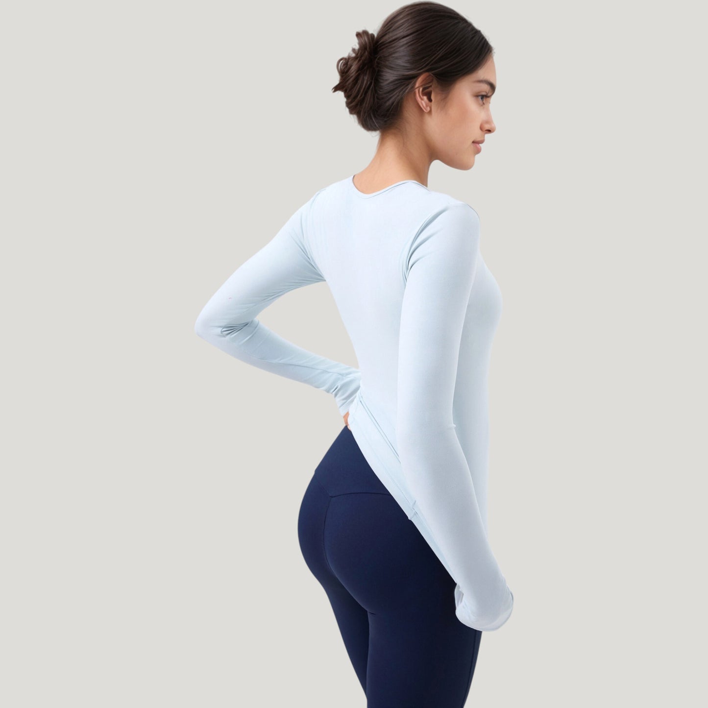 Long Sleeve Fitted Activewear Top with Crew Neck and Thumbhole Cuffs