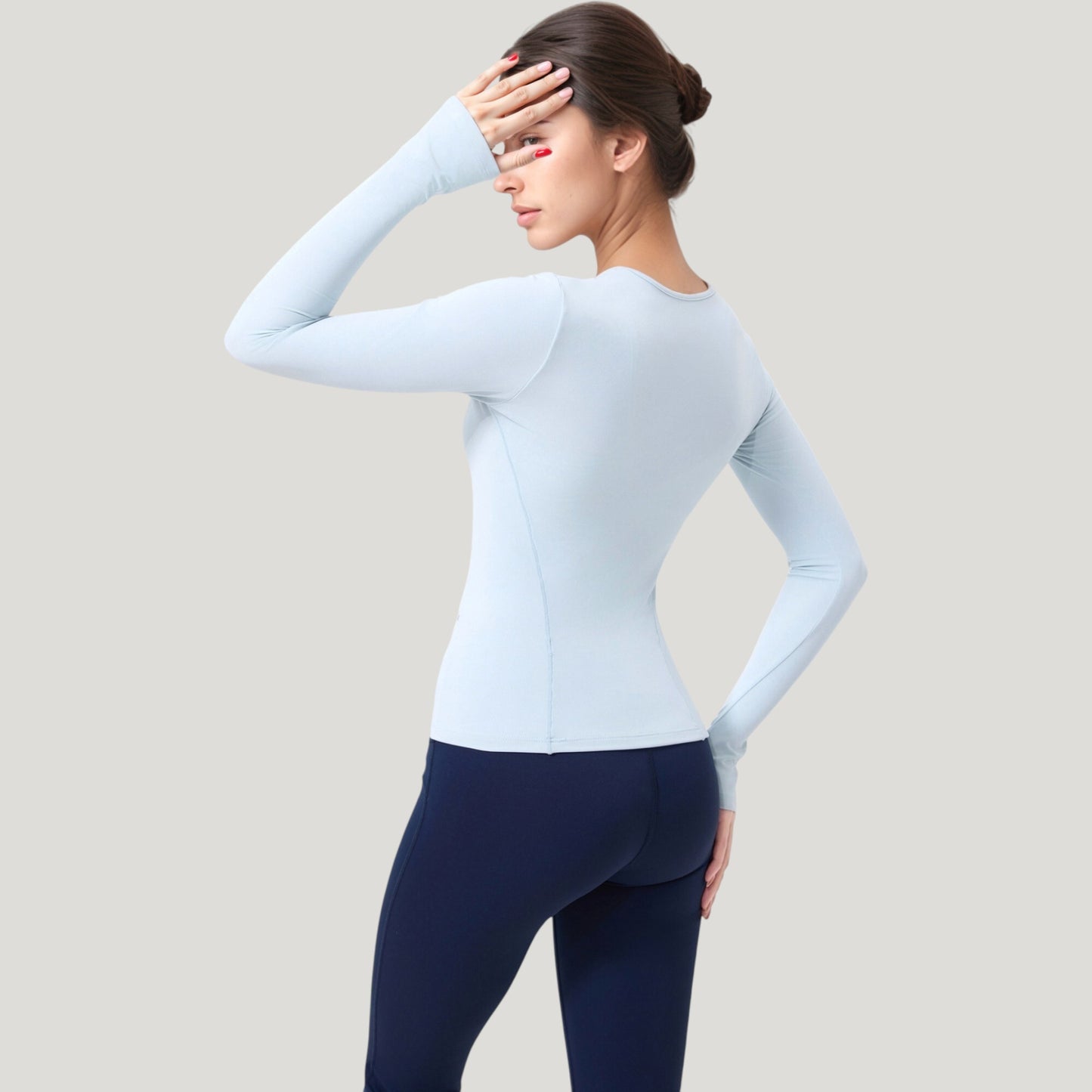 Long Sleeve Fitted Activewear Top with Crew Neck and Thumbhole Cuffs