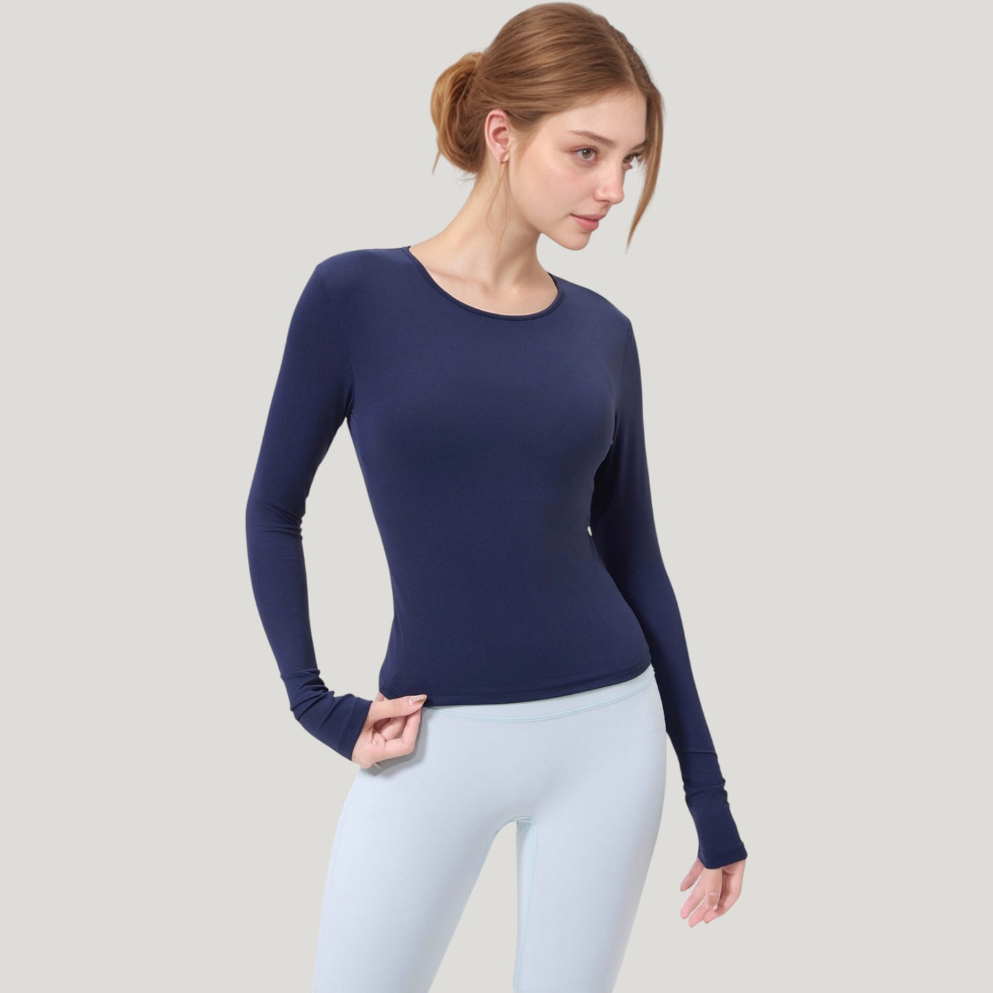 Long Sleeve Fitted Activewear Top with Crew Neck and Thumbhole Cuffs