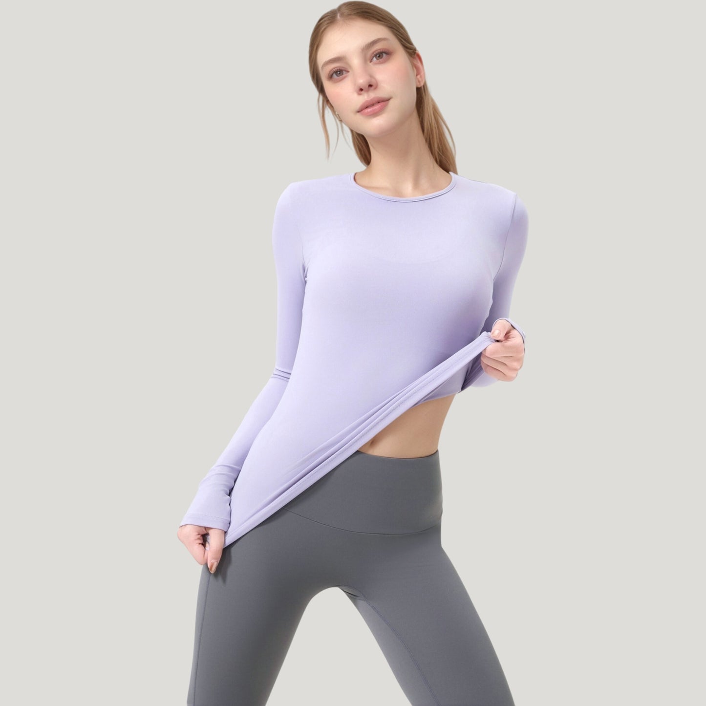 Long Sleeve Fitted Activewear Top with Crew Neck and Thumbhole Cuffs