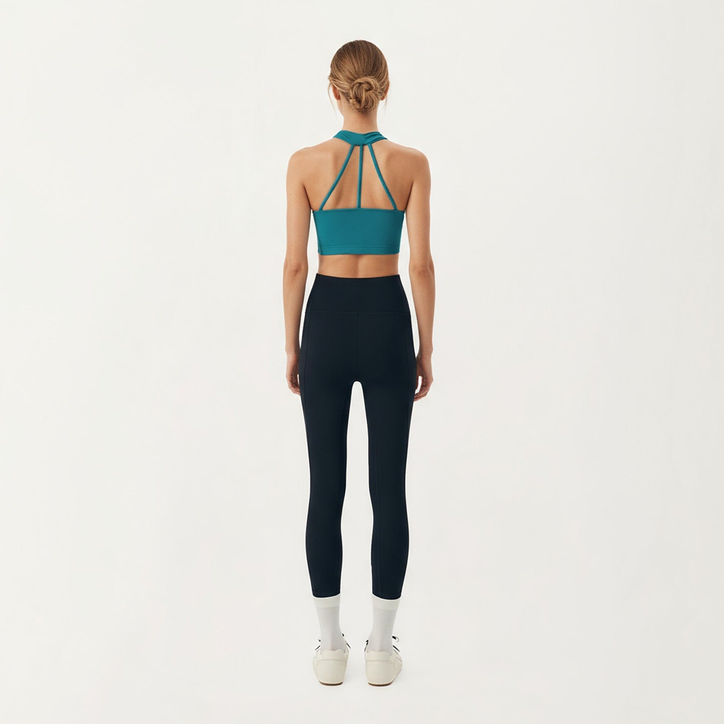 Sleeveless Wrap Front Crop Top with Deep V-Neckline and Twisted Hem Detail