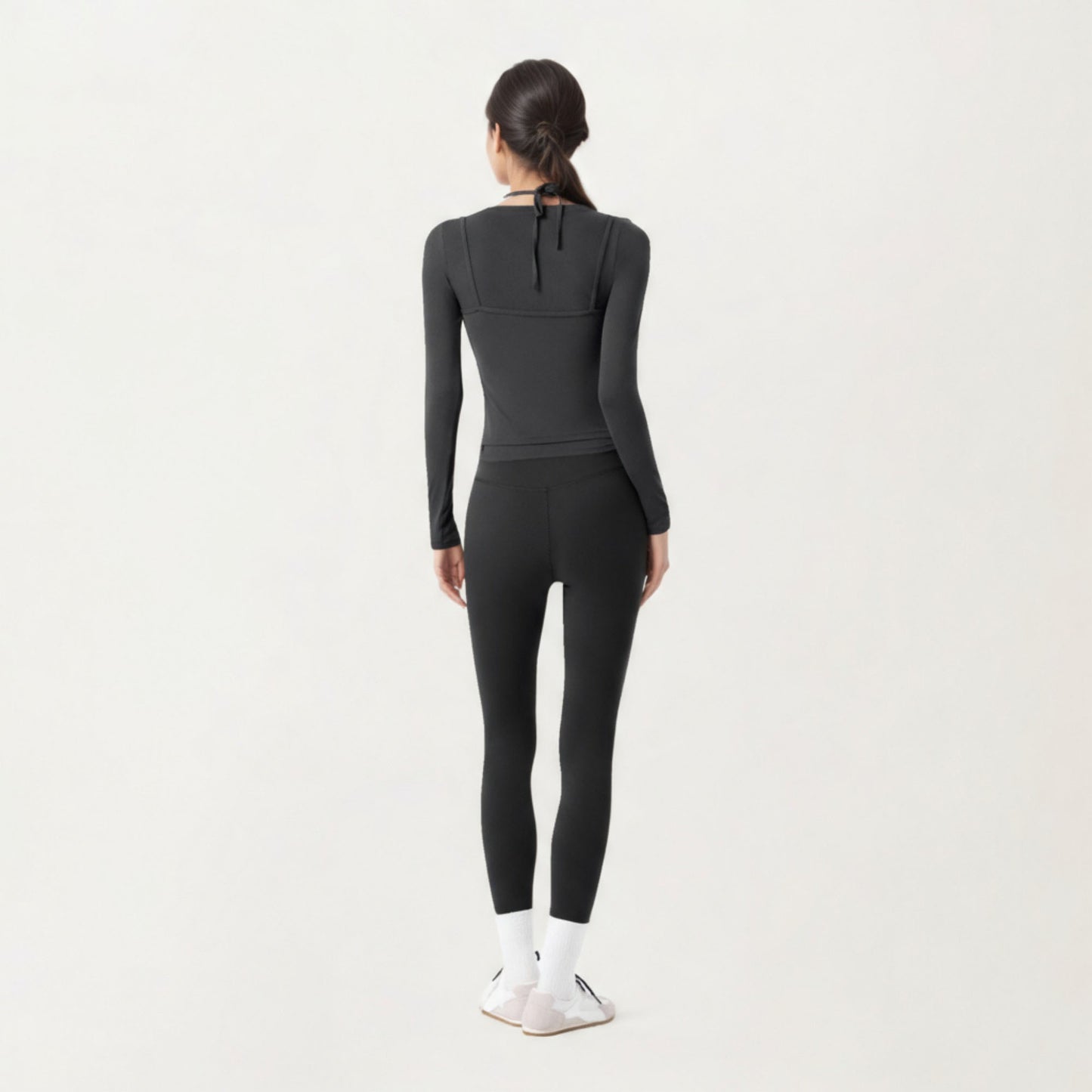 Long Sleeve Active Top with Layered Strap Detail Slim Contoured Fit and Modern Minimal Silhouette