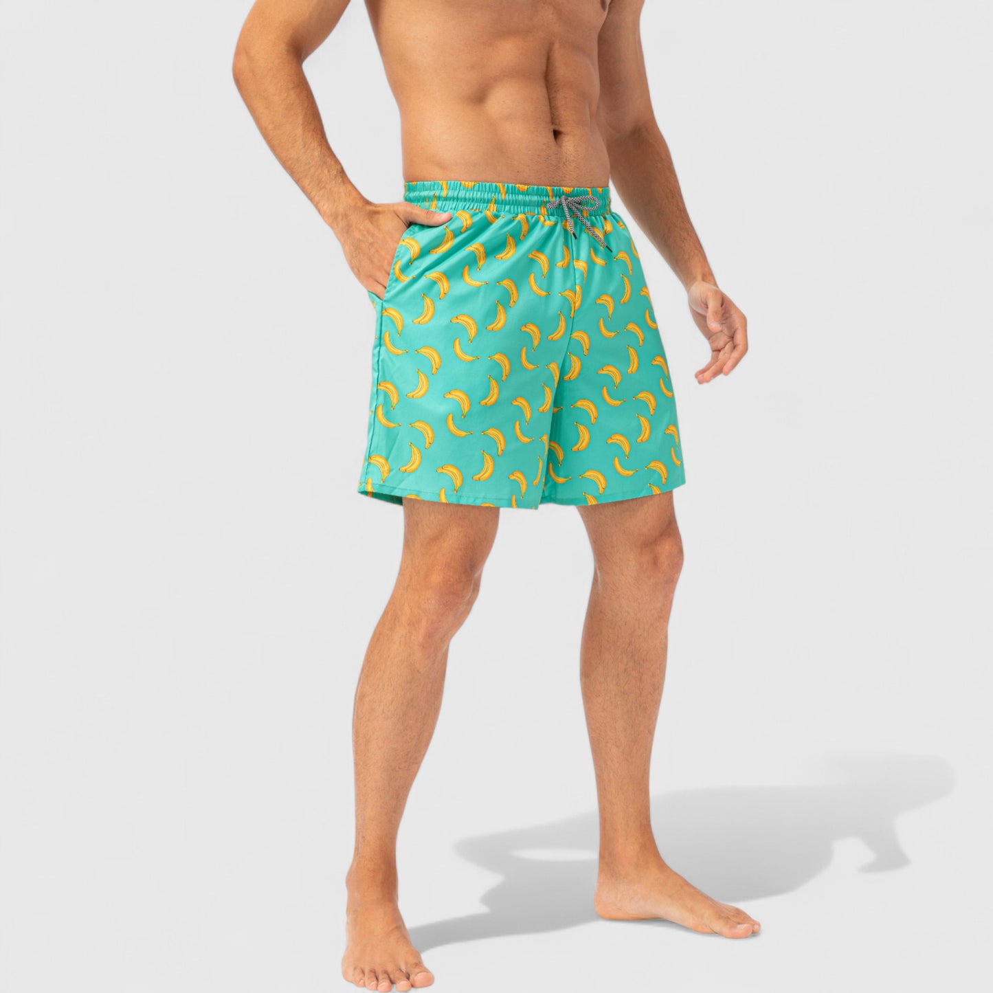 Men's Tropical Print Swim Trunks with Elastic Waistband and Side Pockets