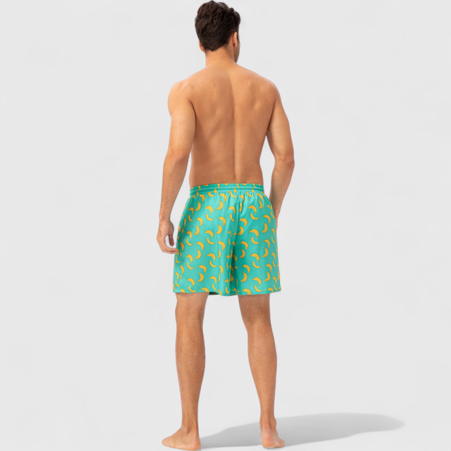 Men's Tropical Print Swim Trunks with Elastic Waistband and Side Pockets