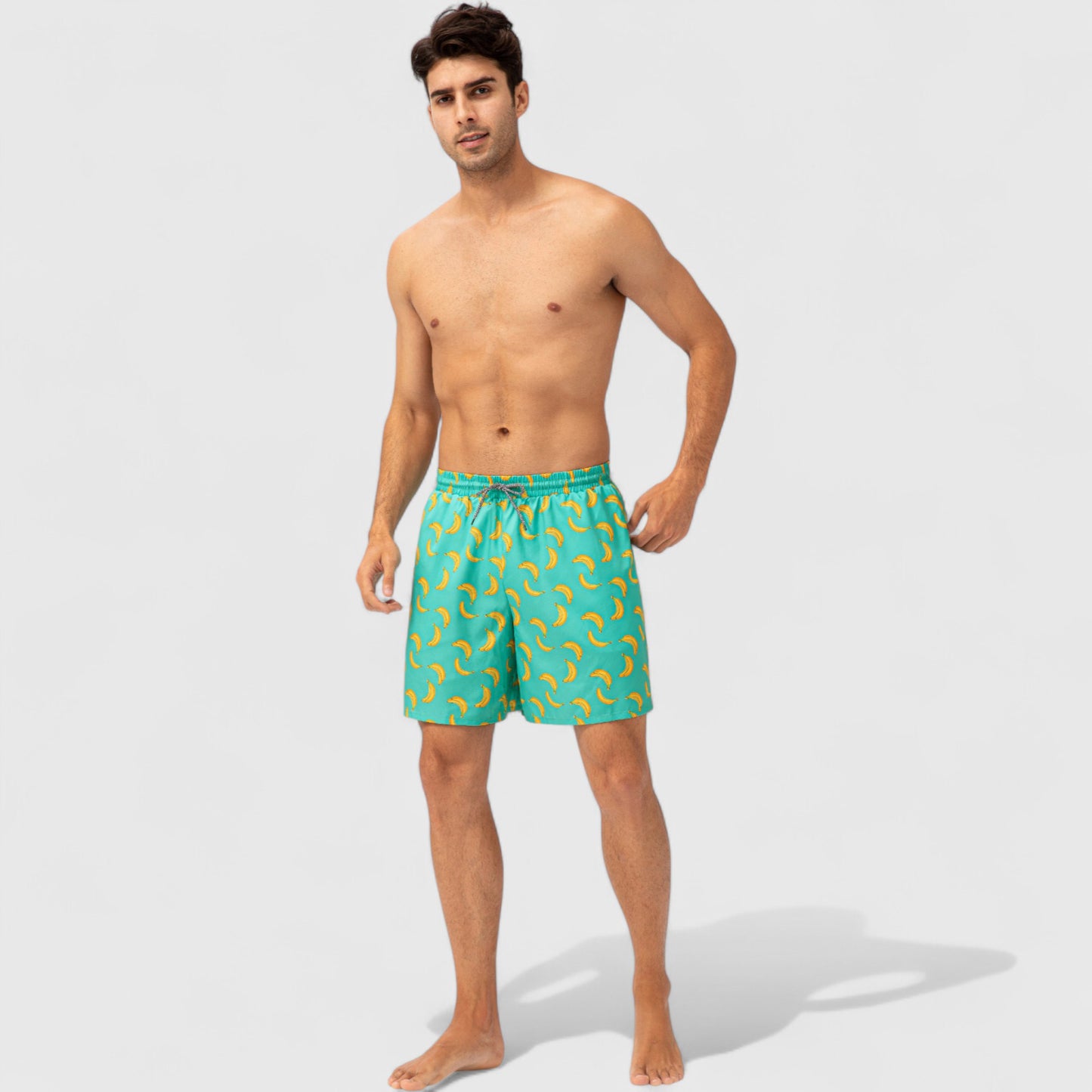Men's Tropical Print Swim Trunks with Elastic Waistband and Side Pockets