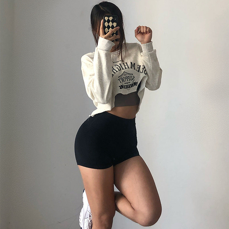 Asymmetrical Raw Hem Long Sleeved Casual Top