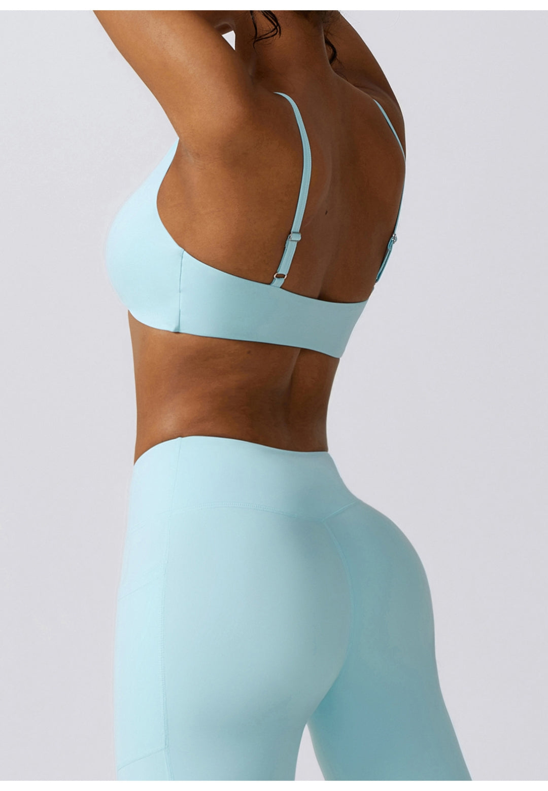 Plunge Neck Twist Front Sports Bra