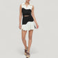 Sleeveless Colorblock Cropped Top with Collared Neckline and Sculpted Contrast Design