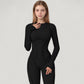 Long Sleeve Fitted One-Piece Activewear Jumpsuit with Contoured Stitching and Open Back Design