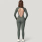 Long Sleeve Fitted One-Piece Activewear Jumpsuit with Contoured Stitching and Open Back Design