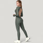 Long Sleeve Fitted One-Piece Activewear Jumpsuit with Contoured Stitching and Open Back Design