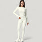 Long Sleeve Fitted One-Piece Activewear Jumpsuit with Contoured Stitching and Open Back Design