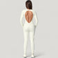 Long Sleeve Fitted One-Piece Activewear Jumpsuit with Contoured Stitching and Open Back Design