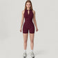 Sleeveless Zip Front Activewear Romper with Open Back and Contoured Fit