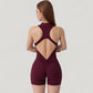 Sleeveless Zip Front Activewear Romper with Open Back and Contoured Fit