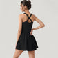 Sleeveless Active Tennis Dress with Flowy Skirt and Crisscross Back Strap Detail