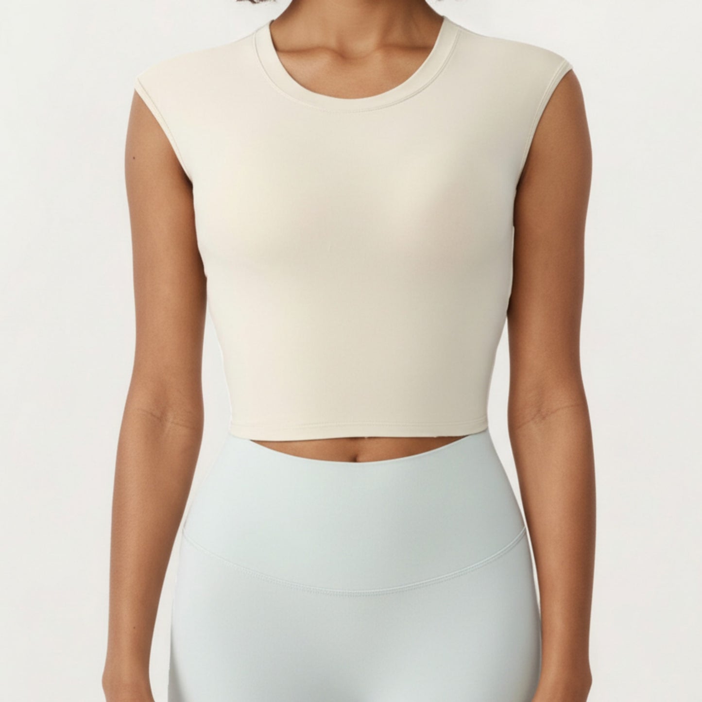 Sleeveless Cropped Fitted Active Tank Top with Smooth Stretch Fabric and Crew Neckline