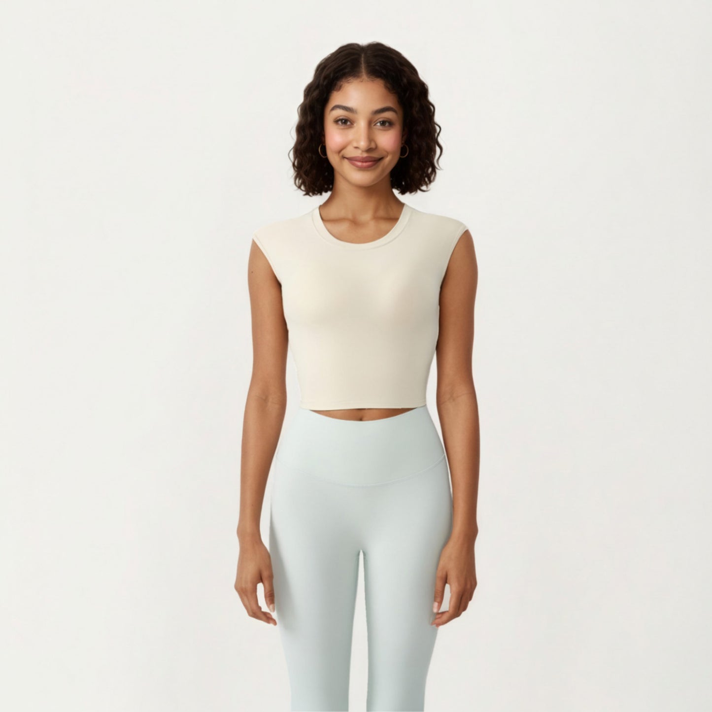 Sleeveless Cropped Fitted Active Tank Top with Smooth Stretch Fabric and Crew Neckline