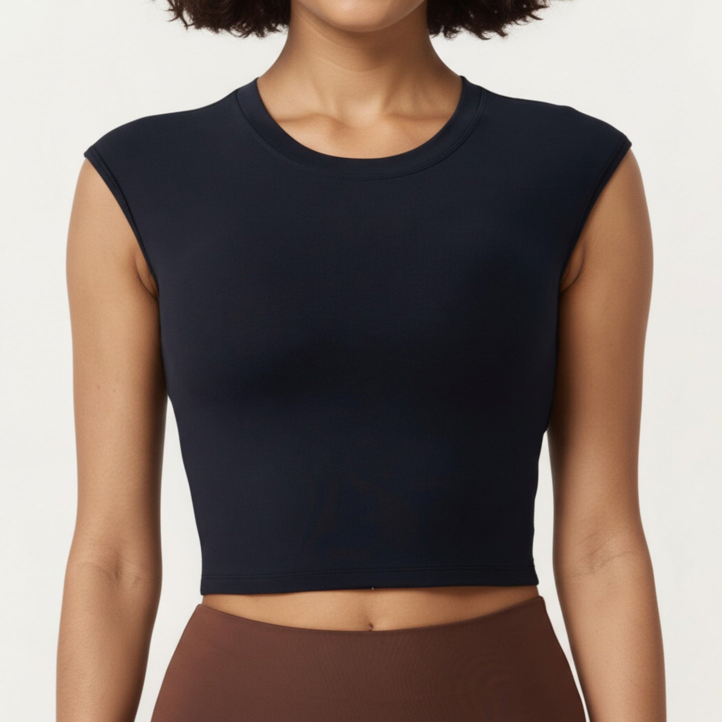 Sleeveless Cropped Fitted Active Tank Top with Smooth Stretch Fabric and Crew Neckline