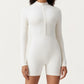 Long Sleeve Fitted Active Romper with Front Half Zip and Stretch One-Piece Design