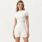 Short Sleeve Fitted Active Romper with Front Half Zip and Stretch One-Piece Design