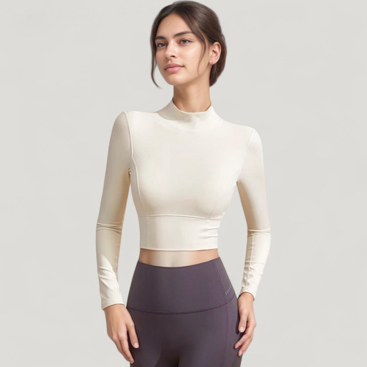 Long Sleeve Crop Top with High Neck and Open Back Design