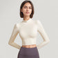 Long Sleeve Crop Top with High Neck and Open Back Design