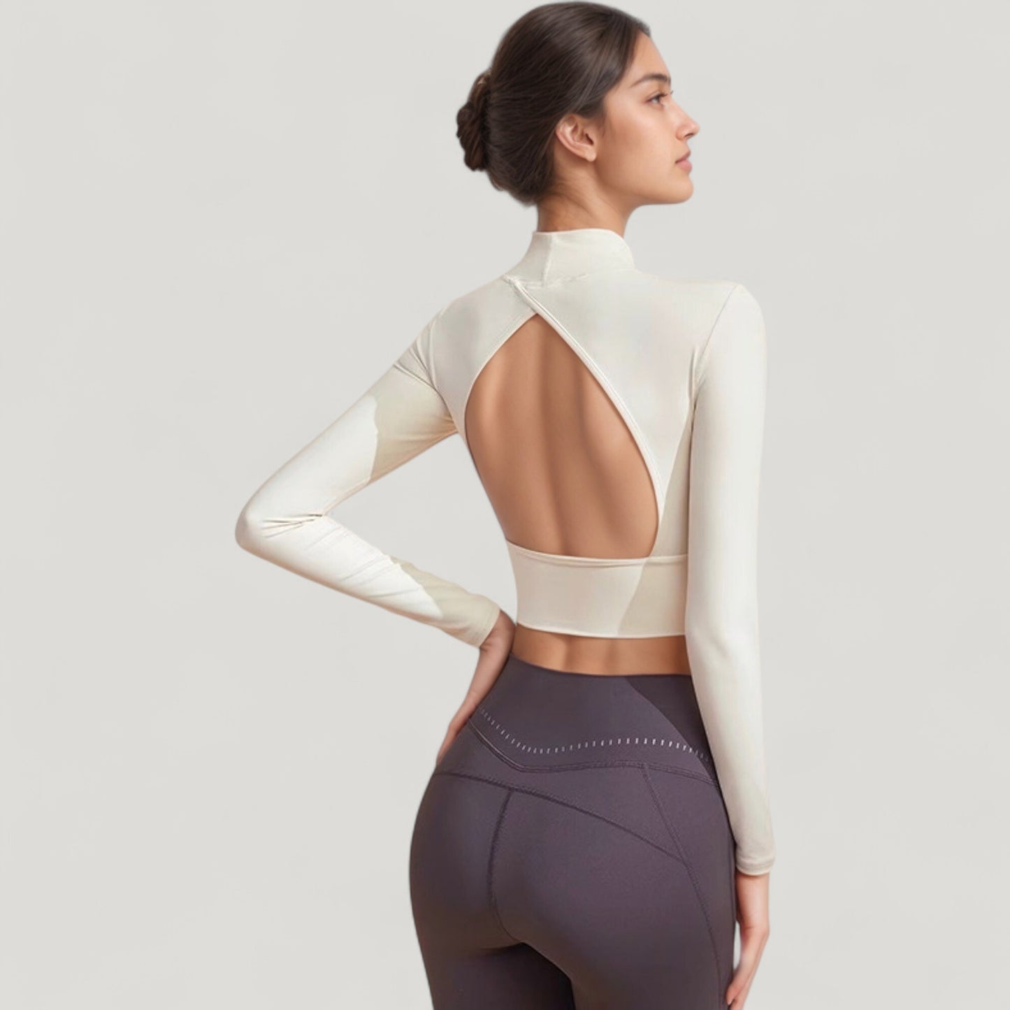 Long Sleeve Crop Top with High Neck and Open Back Design