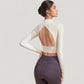 Long Sleeve Crop Top with High Neck and Open Back Design