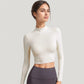 Long Sleeve Crop Top with High Neck and Open Back Design