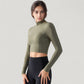Long Sleeve Crop Top with High Neck and Open Back Design
