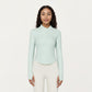 Long Sleeve Ribbed Knit Half Zip Top with Curved Hem and Fitted Silhouette