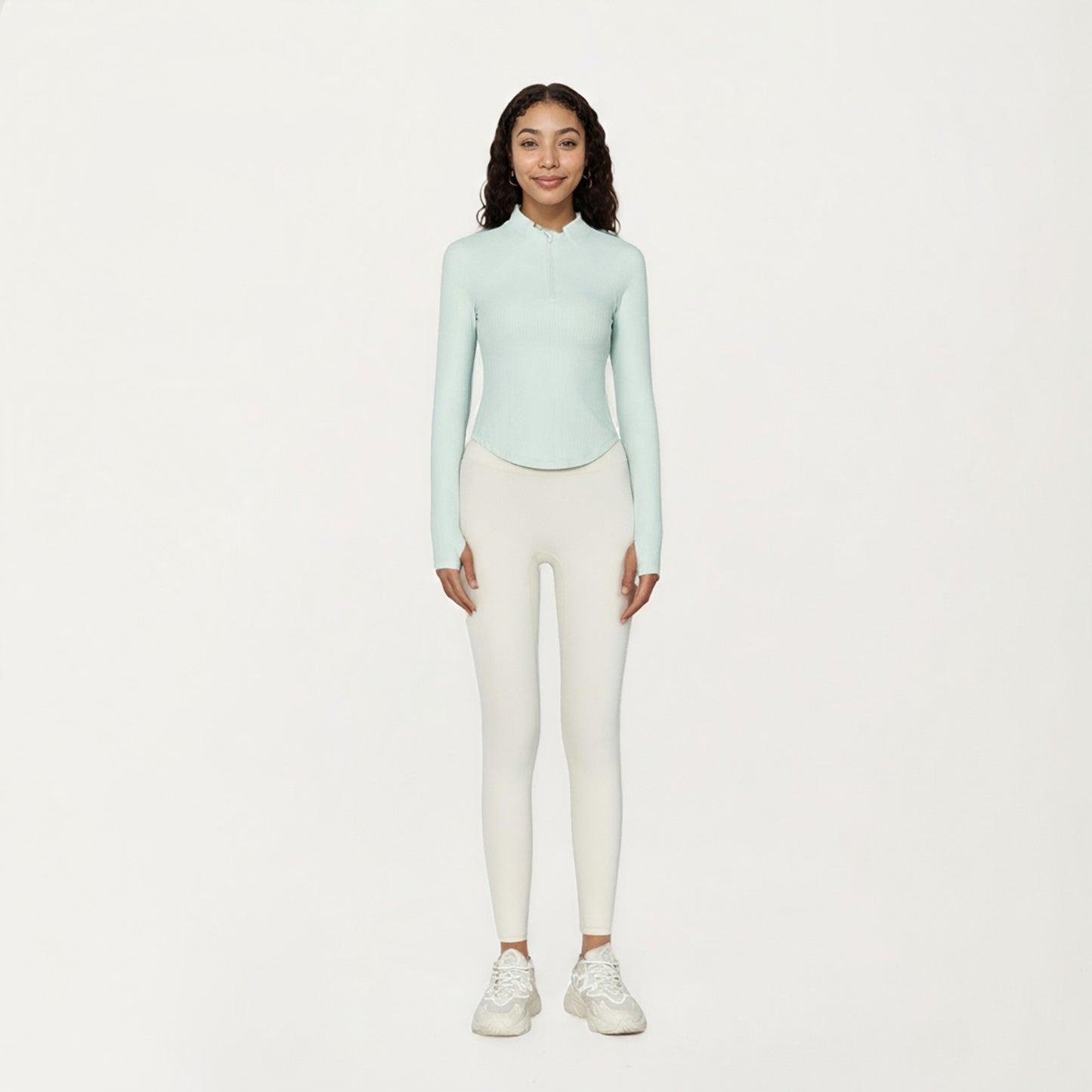 Long Sleeve Ribbed Knit Half Zip Top with Curved Hem and Fitted Silhouette