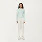 Long Sleeve Ribbed Knit Half Zip Top with Curved Hem and Fitted Silhouette