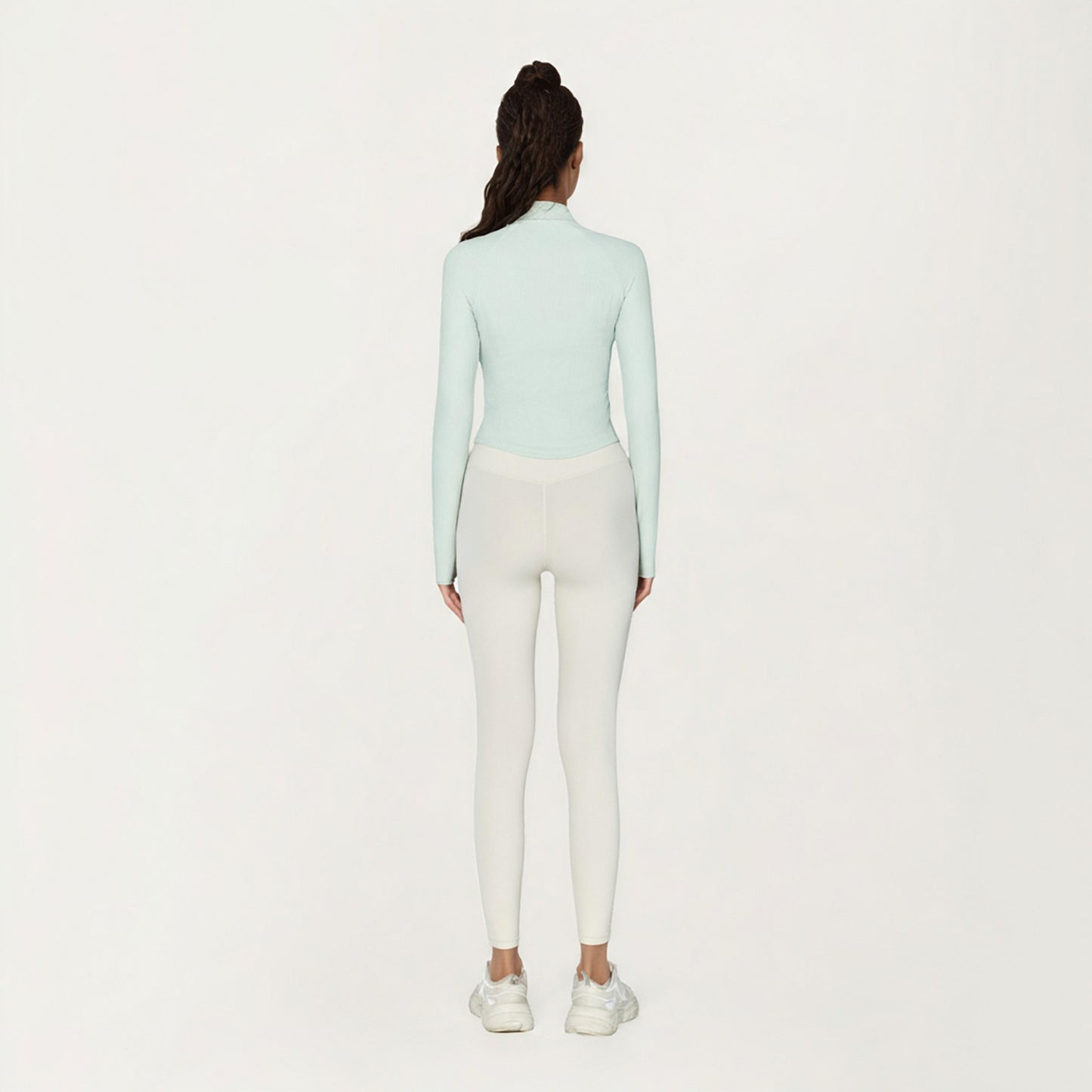 Long Sleeve Ribbed Knit Half Zip Top with Curved Hem and Fitted Silhouette